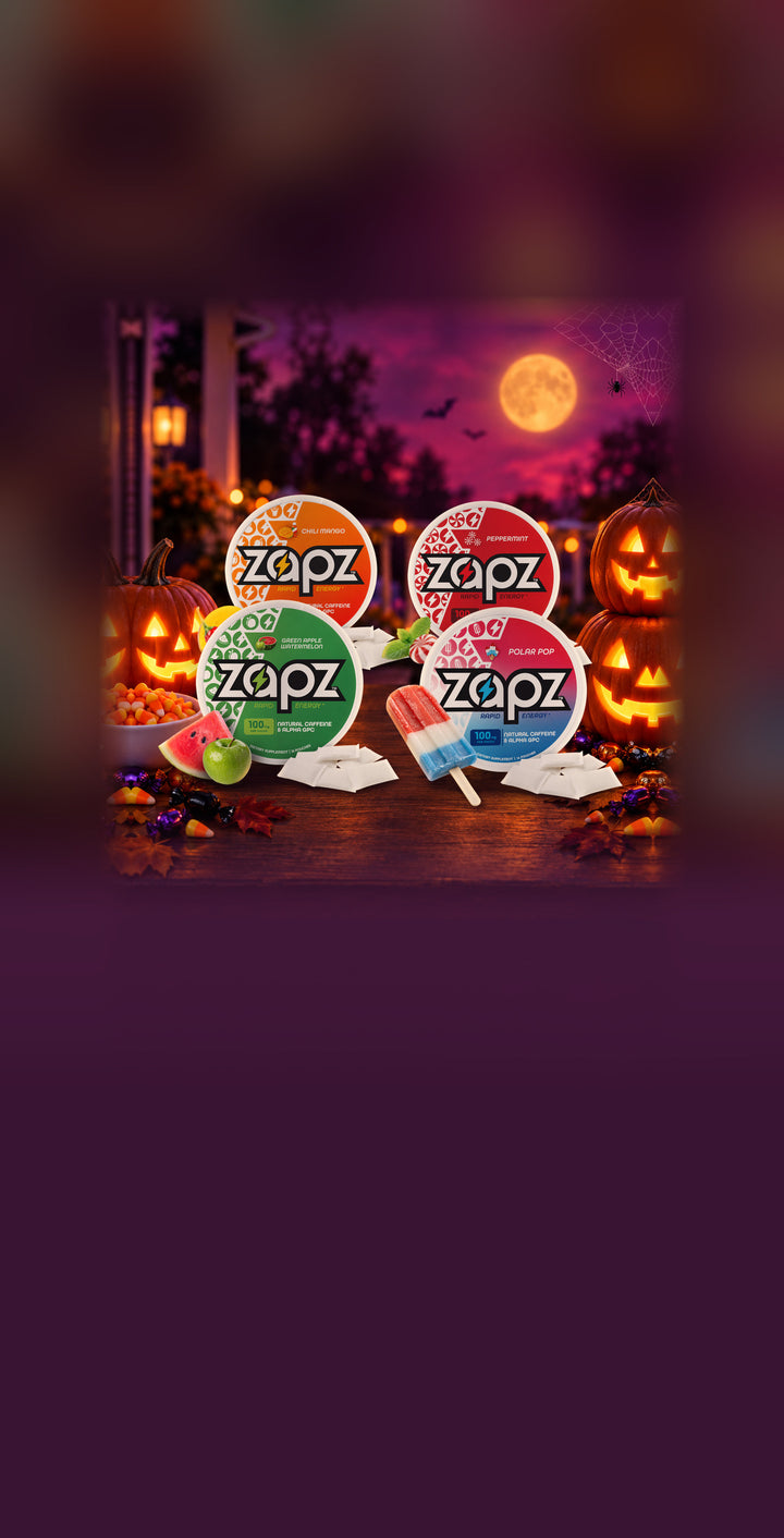 ZAPZ Energy Pouches in Chili Mango, Peppermint, Green Apple Watermelon and Polar Pop on a Halloween porch table with jack-o'-lanterns